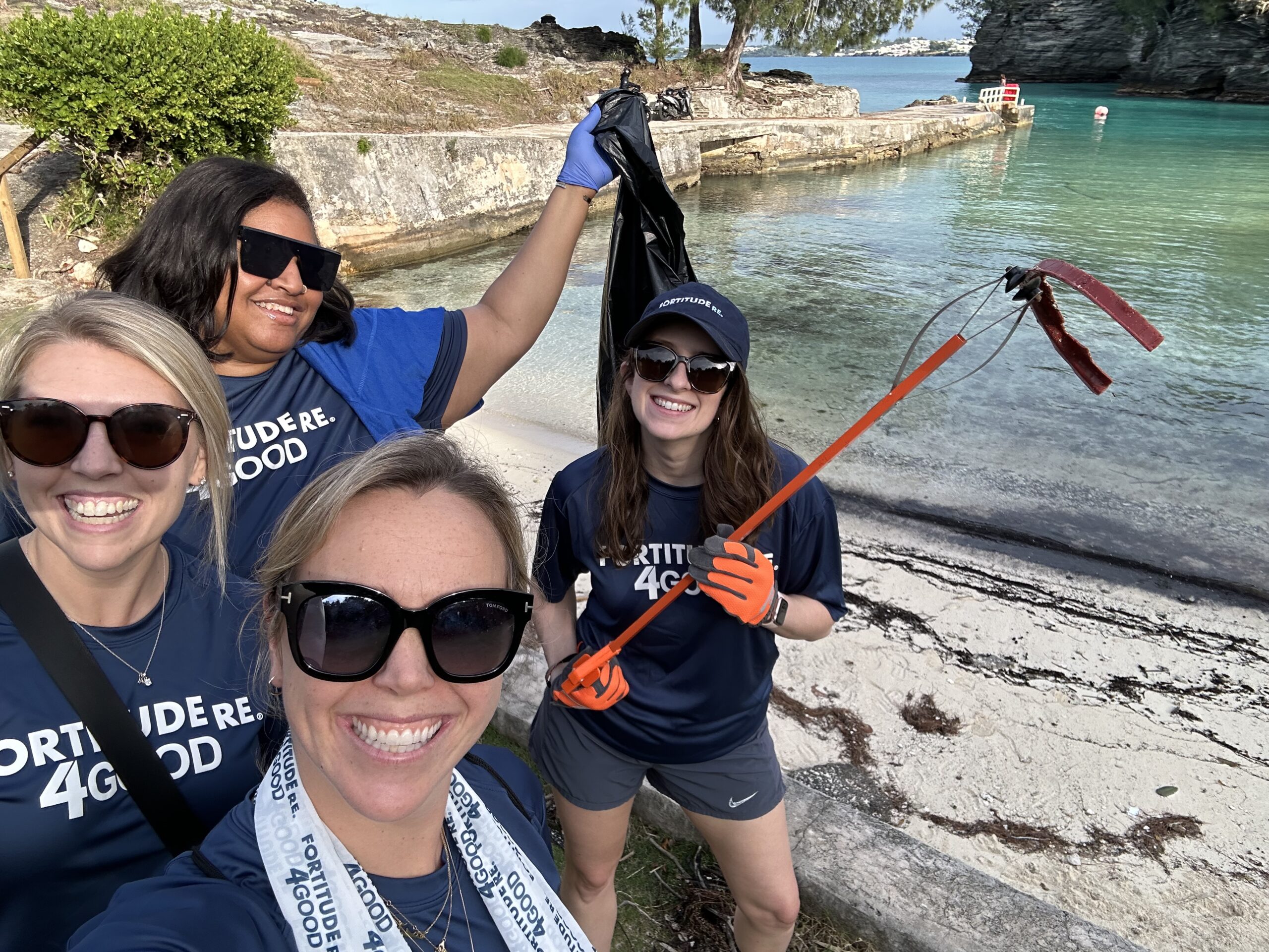 Bermuda colleagues at a beach cleanup.