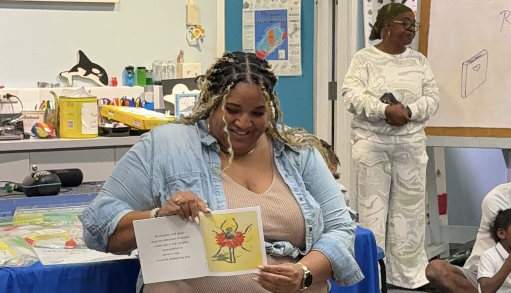 Fortitude Re colleague reads to children at BEN.